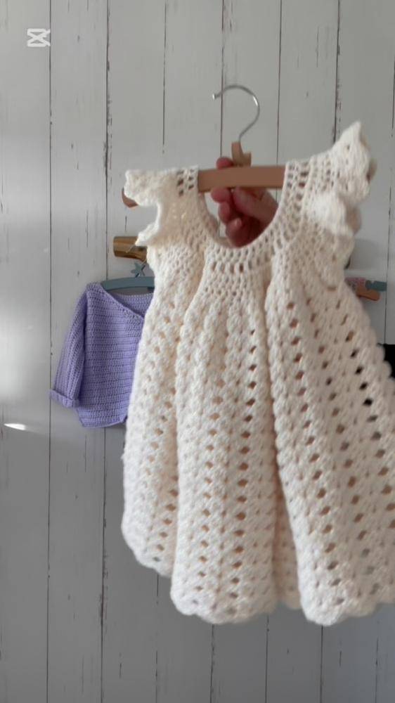 Delicate Cream Crochet Baby Dress with Ruffle Sleeves