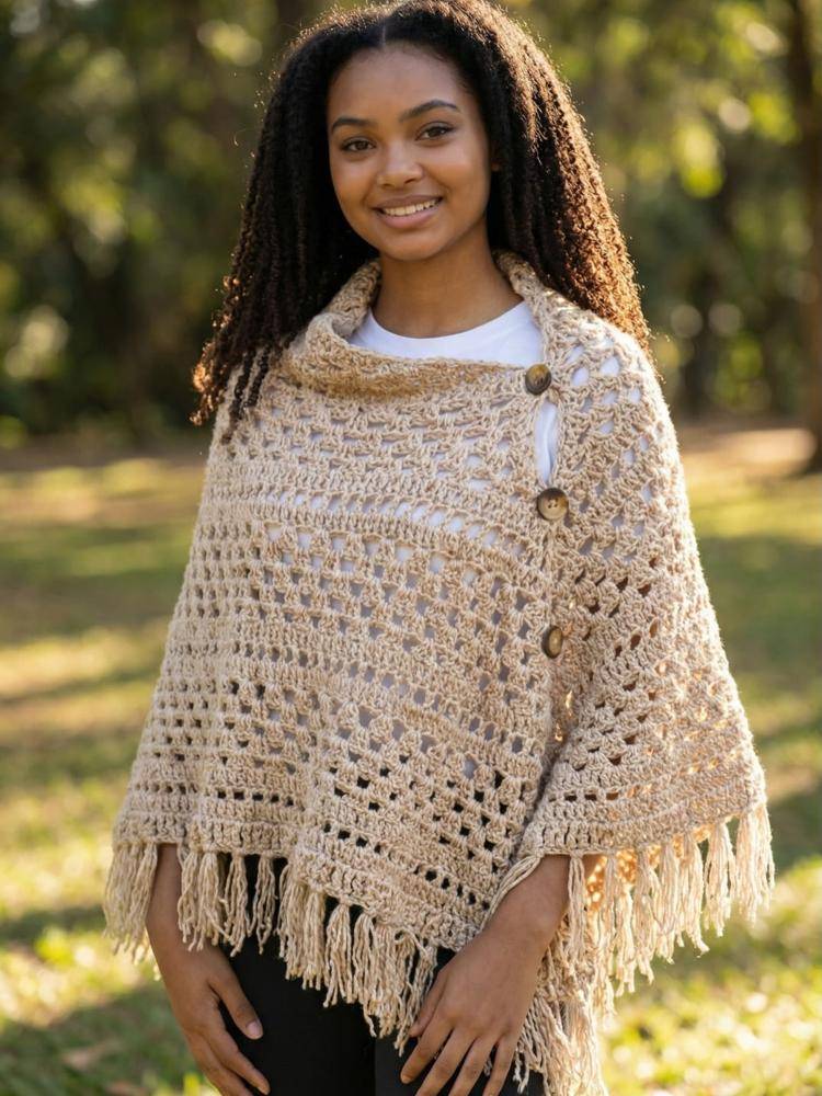 Elegant Crocheted Poncho with Fringe and Buttons