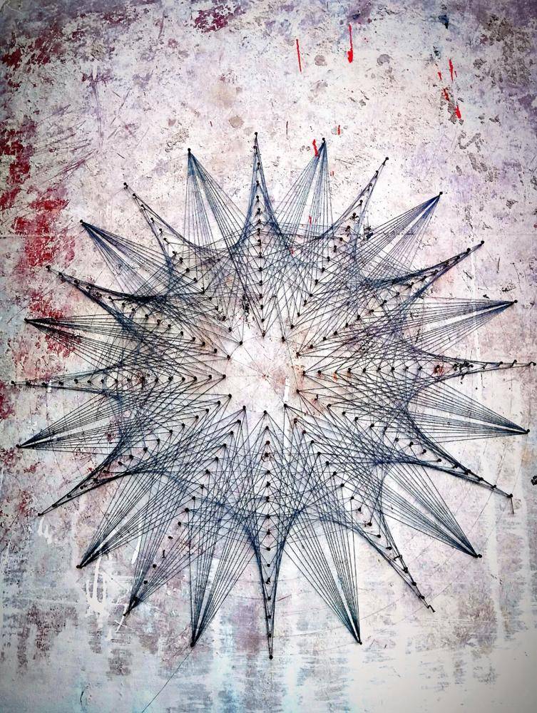 Geometric Starburst String Art Project