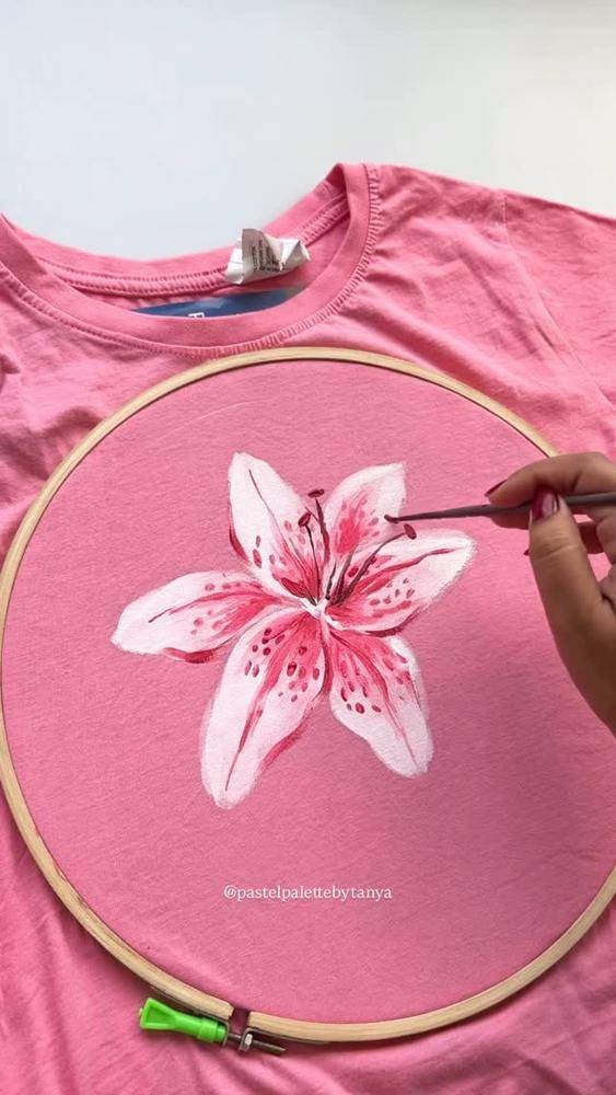 Hand-Painted Lily Design on Pink T-Shirt