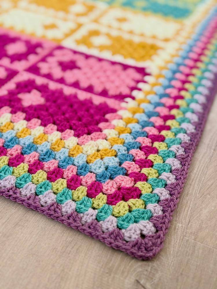 Vibrant Striped Granny Square Crochet Blanket